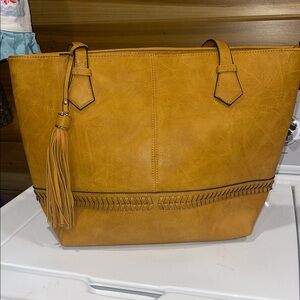 Chic Tan Tote Bag with Tassel Accent
